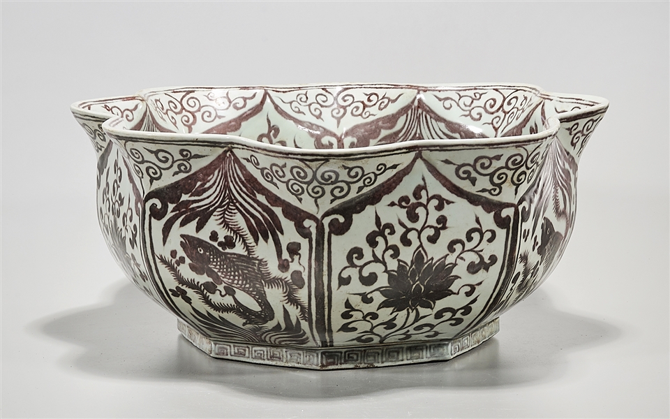 Appraisal: Chinese red and white porcelain petal mouth form basin with