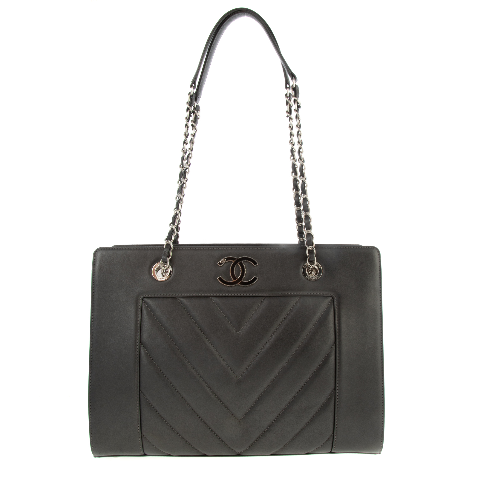 Appraisal: A CHANEL MADEMOISELLE VINTAGE SHOPPING TOTE A metallic gray Lambskin