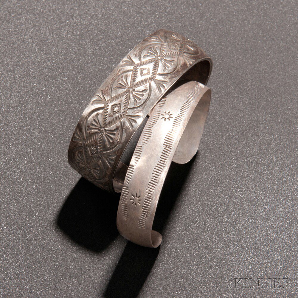 Appraisal: Two Navajo Stamp-decorated Silver Bracelets inner dia to in Estimate