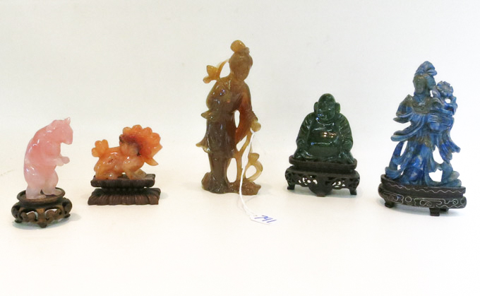 Appraisal: FIVE ASIAN INSPIRED CARVED HARDSTONE FIGURES including rose quartz serpentine