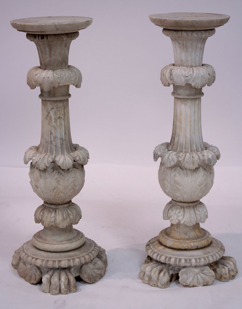 Appraisal: Pair Ornately Carved Alabaster Pedestals th c the column with