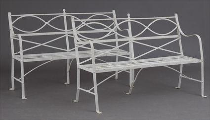 Appraisal: PAIR OF WHITE PAINTED CAST IRON GARDEN BENCHES Each openwork