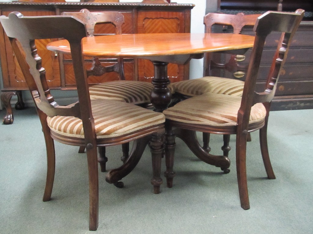 Appraisal: Victorian mahogany oval table with four Victorian mahogany dining chairs