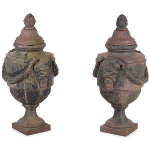 Appraisal: A Pair of Cast Iron Covered Garden Urns Late th