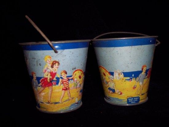 Appraisal: A pair of Blue Bird seaside pails with swing handles