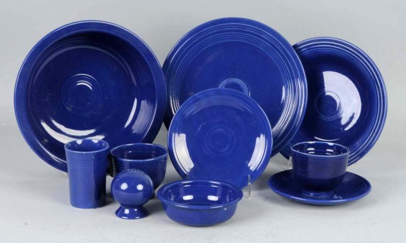 Appraisal: Lot of Dark Blue Colored Fiestaware Description Includes four serving