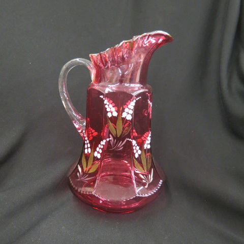 Appraisal: Victorian Cranberry Art Glass Pitcher enameled floral gold trim