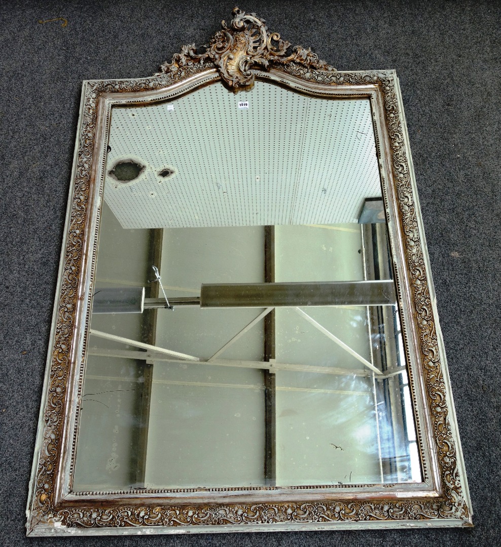 Appraisal: A th century parcel gilt cream painted arch top rectangular