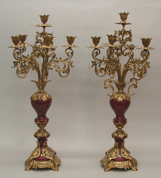 Appraisal: Pair of oxblood flambe porcelain candelabra with brass branches and