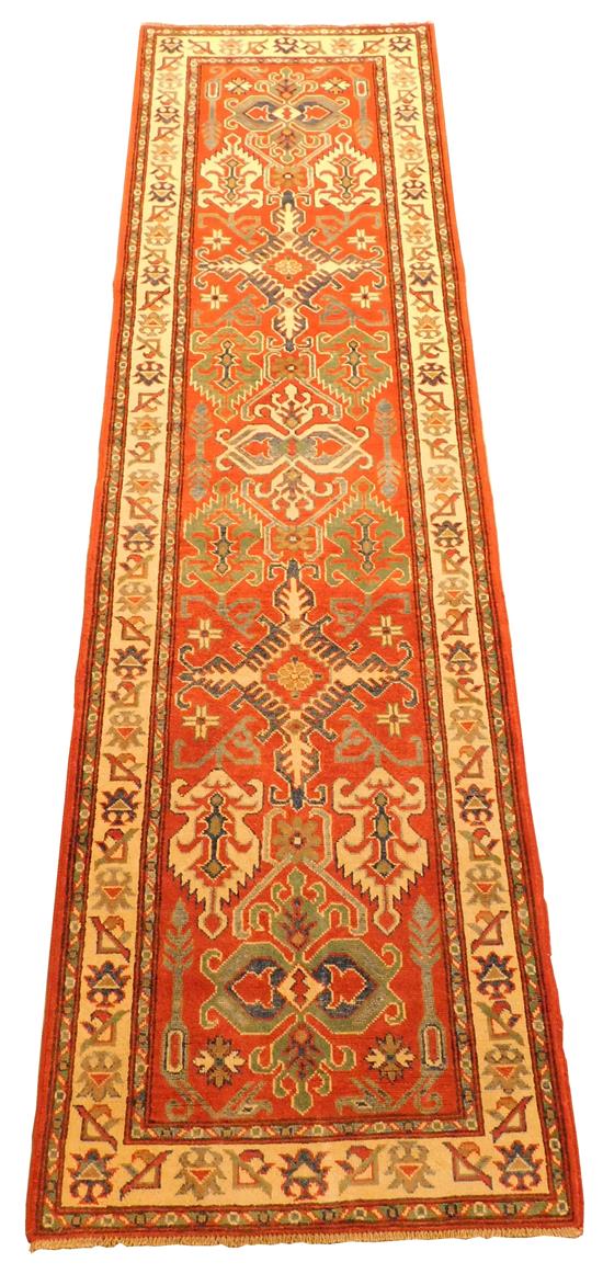 Appraisal: RUG Uzbek Kazak runner ' ' brick red field cream