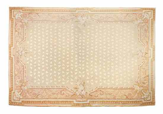 Appraisal: A Rose and Beige Colored Aubusson Rug having a central