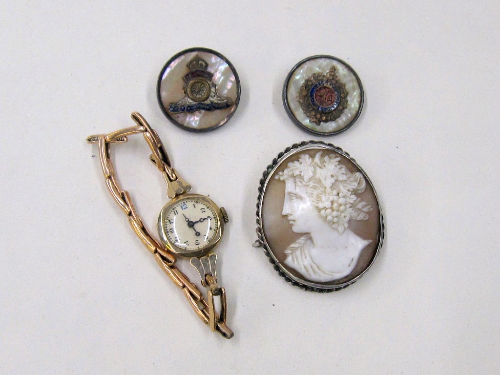 Appraisal: Lot comprising two military buttons a cameo brooch and a