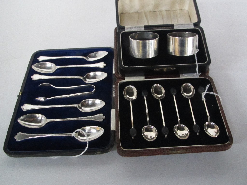 Appraisal: Lot comprising two cased sets of six silver spoons one