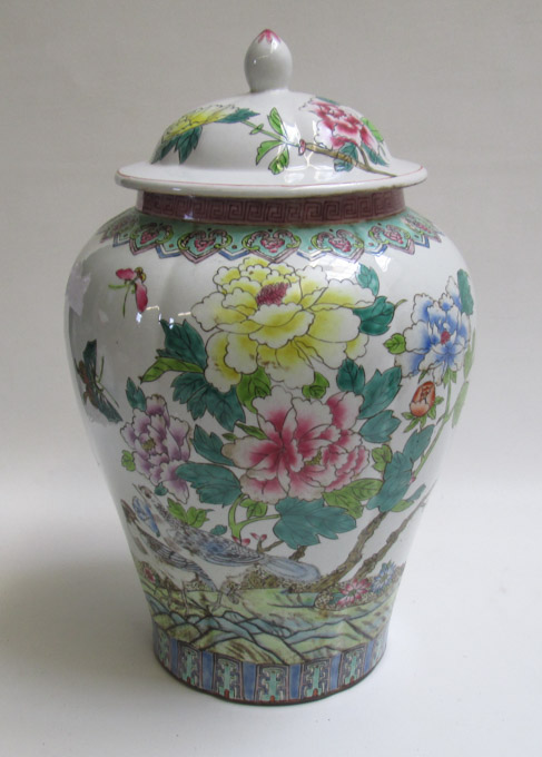 Appraisal: CHINESE HAND ENAMELED COVERED VASE decorated with colorful bird butterfly