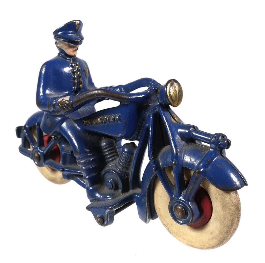 Appraisal: CHAMPION CAST IRON POLICE COP RIDER MOTORCYCLE TOYChampion cast iron