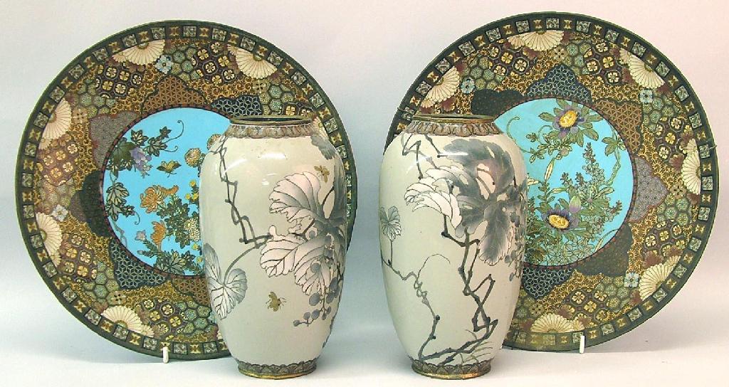 Appraisal: Pair of detailed cloisonne chargers the centres painted with flowering