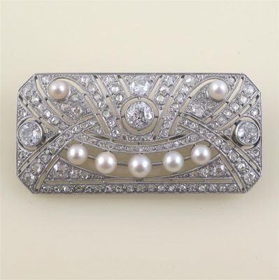 Appraisal: A diamond and cultured pearl mounted plaque brooch scroll pierced