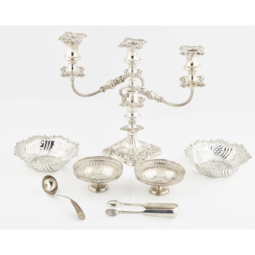 Appraisal: A collection of silver to include a toddy ladle William