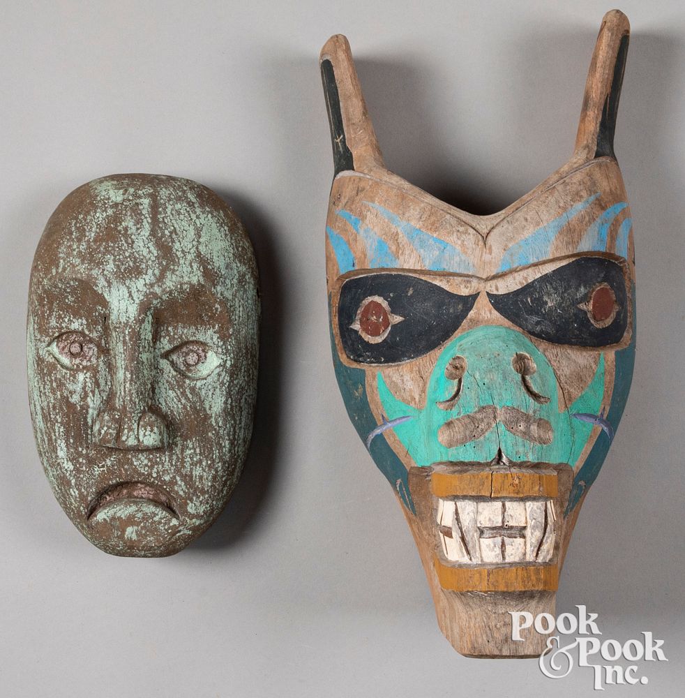 Appraisal: Two Northwest Coast carved and painted masks Two Northwest Coast