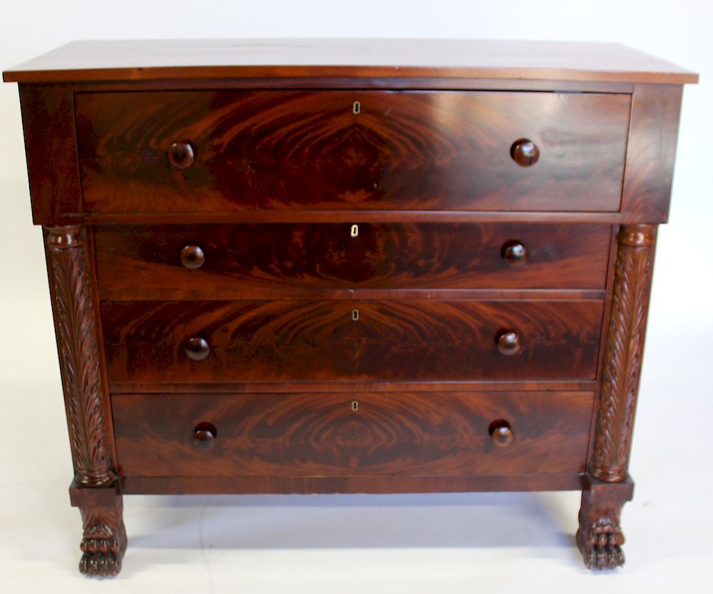 Appraisal: Empire Mahogany Chest with Carved Columns and Claw Feet From