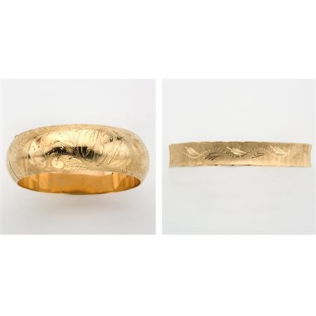 Appraisal: Group of Five Gold and White Gold Bangle Bracelets and