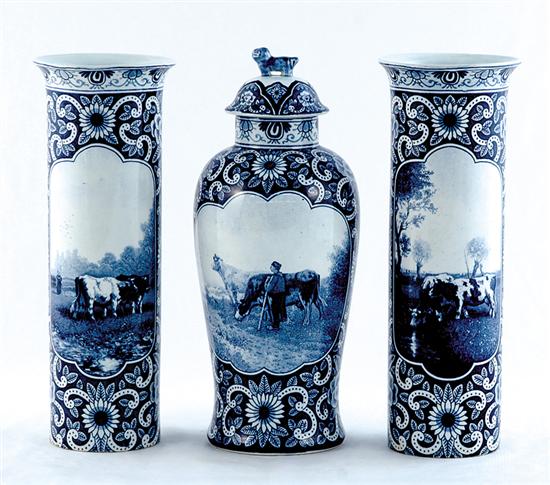 Appraisal: Delft garniture set late th early th century urn with