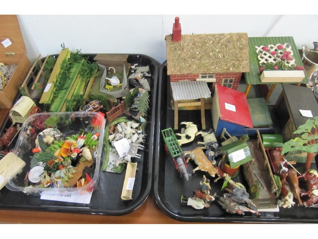 Appraisal: Lot comprising two trays of model farm animals and buildings