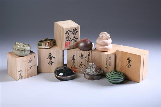 Appraisal: SEVEN JAPANESE STONEWARE AND PORCELAIN BOXES Brown glazed chestnut-form box