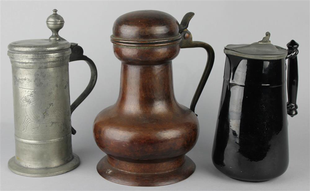 Appraisal: THREE VARIOUS TANKARDS including one Continental pewter with wriggle work