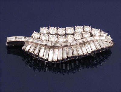 Appraisal: A diamond brooch by Boucheron Set with graduated circular brilliant