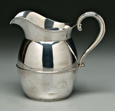 Appraisal: Sterling silver water pitcher round body helmet form spout scroll