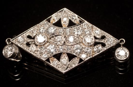 Appraisal: Late Victorian unmarked white gold and diamond lozenge-form pendant brooch