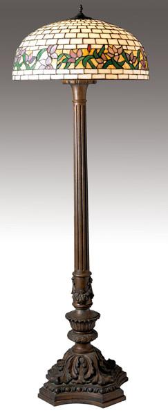 Appraisal: PERIOD LIGHTING Floor lamp with a leaded glass shade of