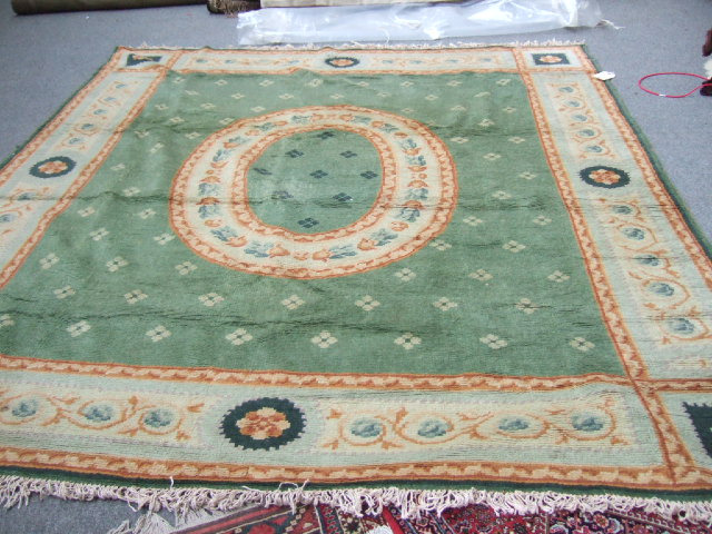 Appraisal: A Sovonnerie carpet the sage field with a bold roundel