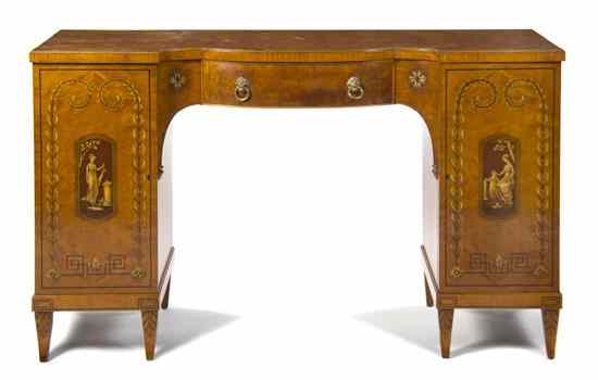 Appraisal: An Edwardian Satinwood Sideboard having a serpentine top over a