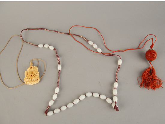 Appraisal: Three Early Asian Necklaces one with oval white glass beads