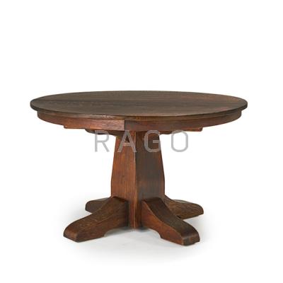 Appraisal: GUSTAV STICKLEY Dining table with split pedestal and four leaves