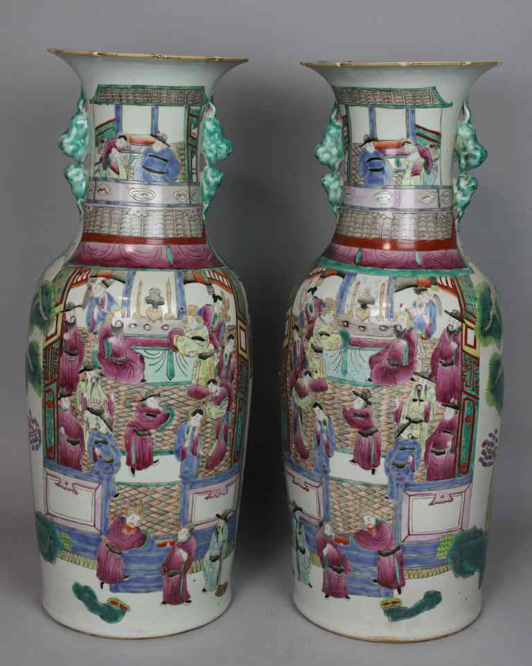 Appraisal: PAIR OF CHINESE FAMILLE ROSE BALUSTER VASES decorated with figures