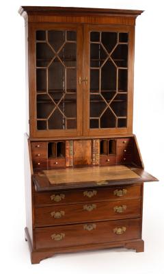 Appraisal: A George III mahogany bureau bookcase the upper section enclosed