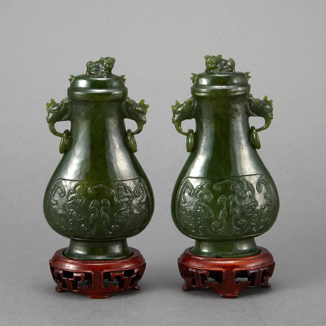 Appraisal: Pair of Chinese Spinach Jade Covered Vases Each pear form