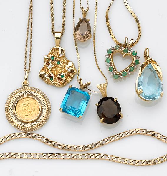 Appraisal: A miscellaneous collection of gem-set diamond and k gold pendants