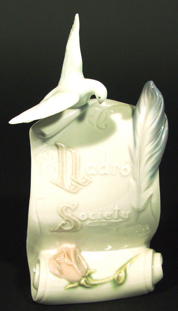 Appraisal: Lladro Society porcelain advertising sign surmounted with a dove printed