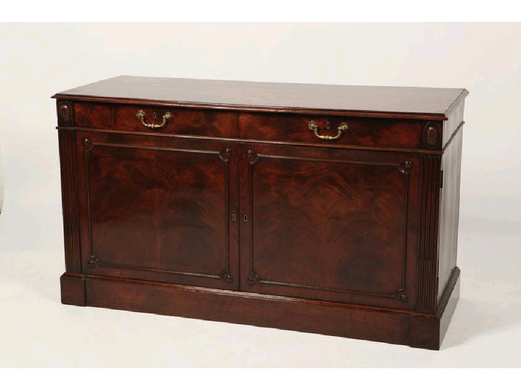 Appraisal: A PAIR OF GEORGE III MAHOGANY LIBRARY CABINETS in the