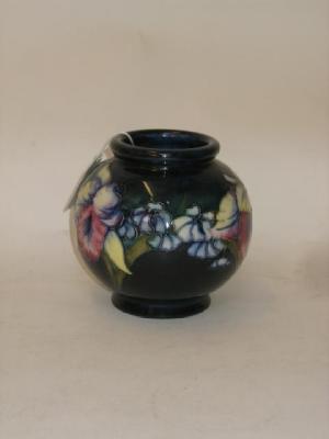 Appraisal: A WALTER MOORCROFT POTTERY VASE of globular form tube lined