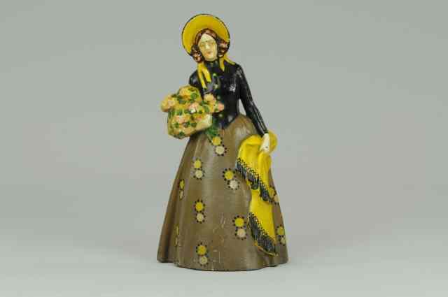 Appraisal: WOMAN WITH FLOWERS AND SHAWL DOORSTOP Cast iron stamped ''