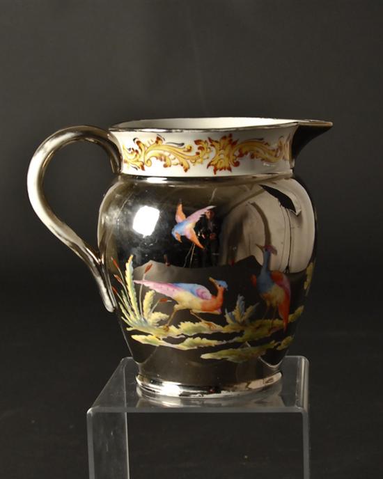 Appraisal: A th C Handpainted Silver Lustre Pitcher unmarked with exotic