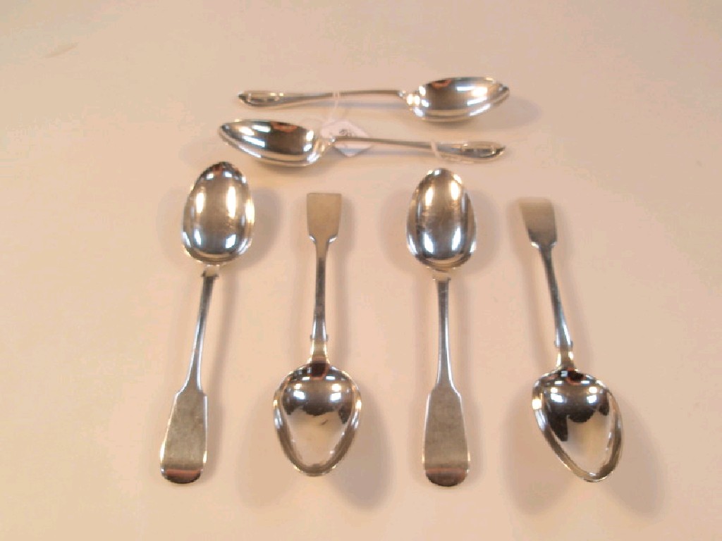 Appraisal: Four thC silver fiddle pattern tablespoons various assay marks and