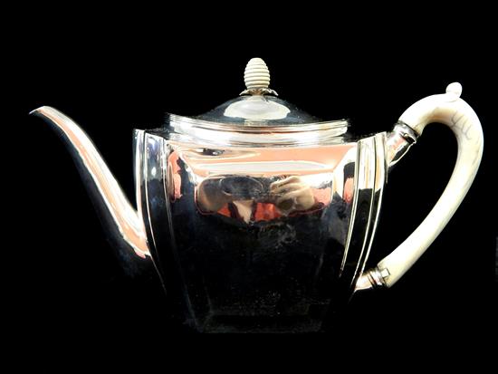 Appraisal: STERLING English teapot with ivory handle hinged lid with wooden