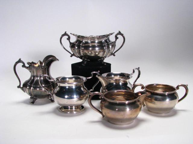 Appraisal: Three sets of sterling silver creamers and sugars including Hampton