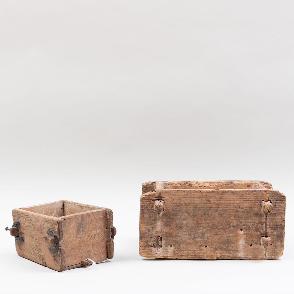 Appraisal: Two Metal-Mounted and Carved Pine Cheese Boxes Each fitted with